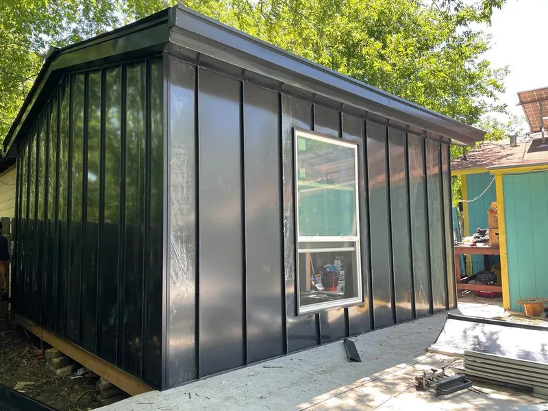 Black standing seam metal wall panels for Roof Inspection in Palm River-Clair Mel